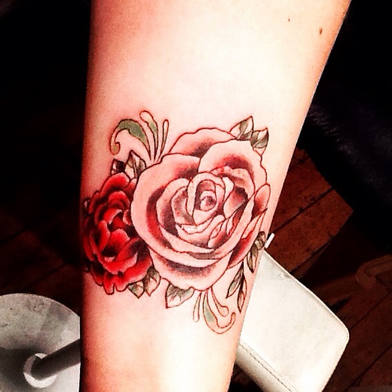 This little rose tattoo is inspired by some imagery from beautiful vintage 